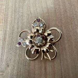 Vintage Coro Gold-Tone Clear and Ruby Colored Crystal Floral Brooch.